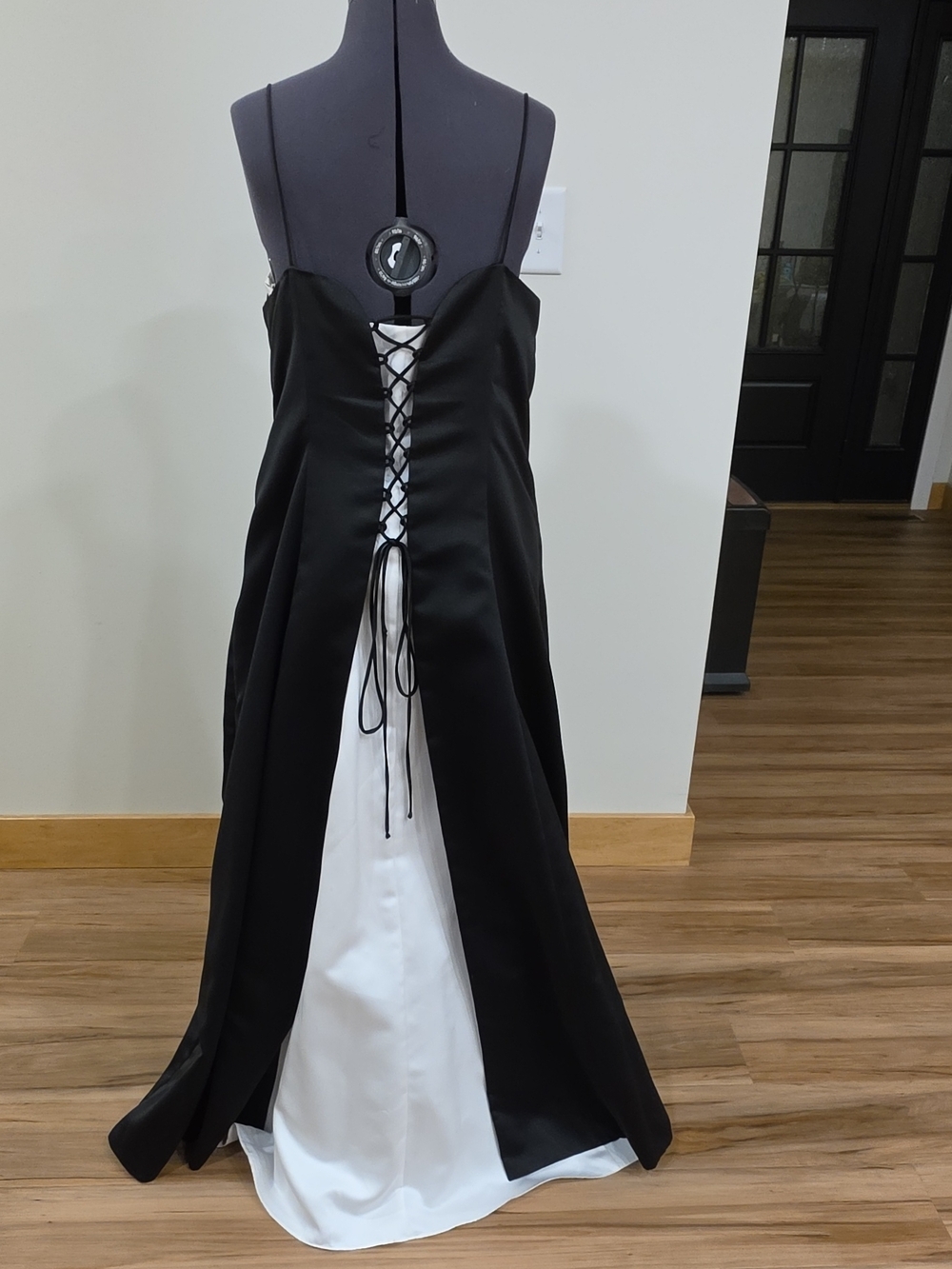 Betsy & Adam Black Gown with White Accent Strap